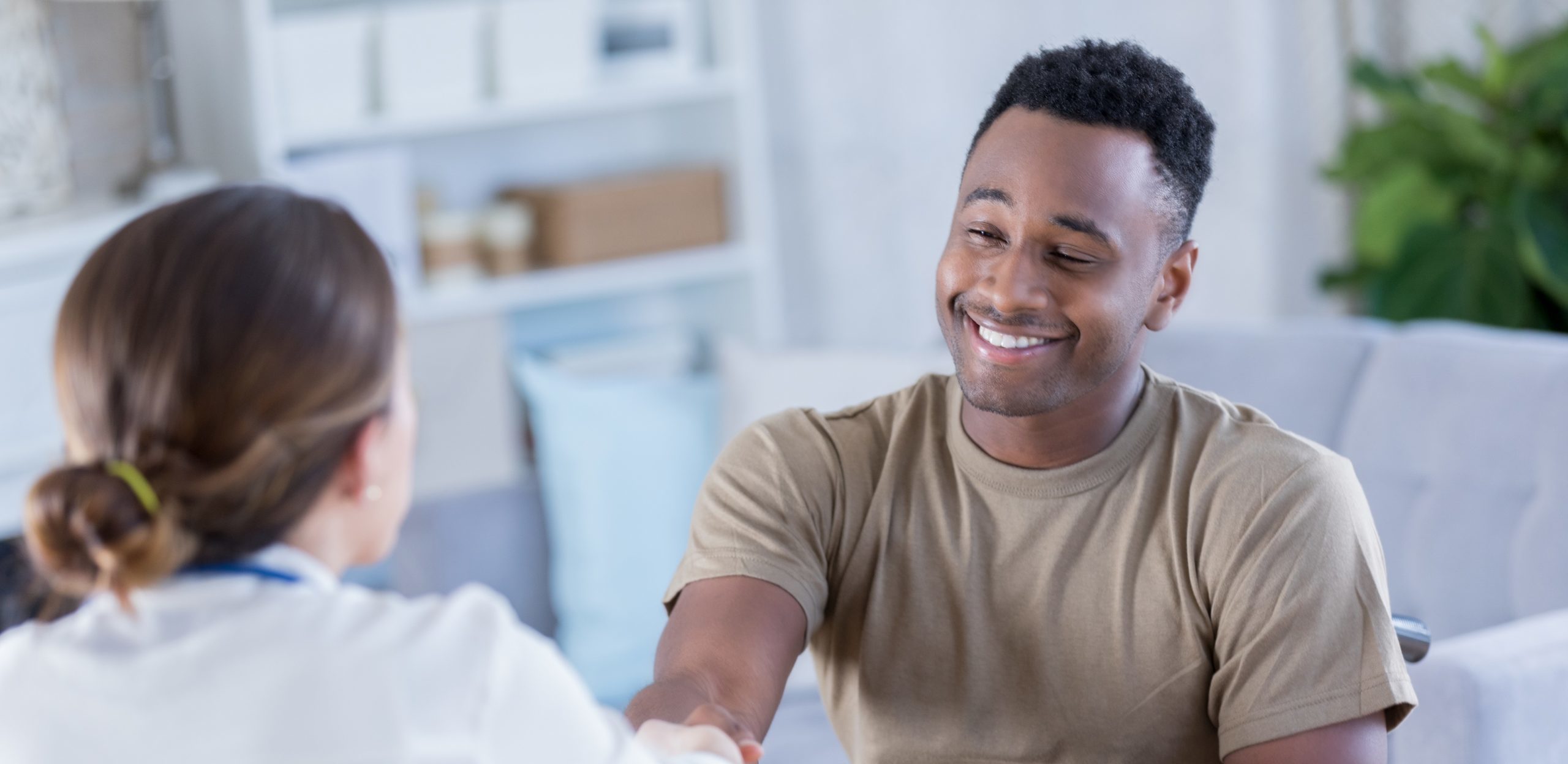 Young military officer thanks therapist for help with PTSD