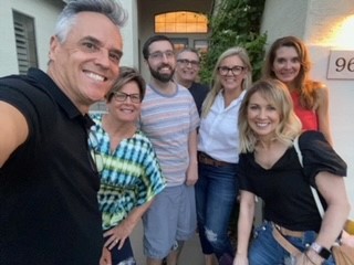 Pictured is Vocational Specialist Ted, in the forefront left, and Clinical Coordinator Christi and Neuropsychologist Suzanne Griffin on the right. Behind is patient Jason with his family