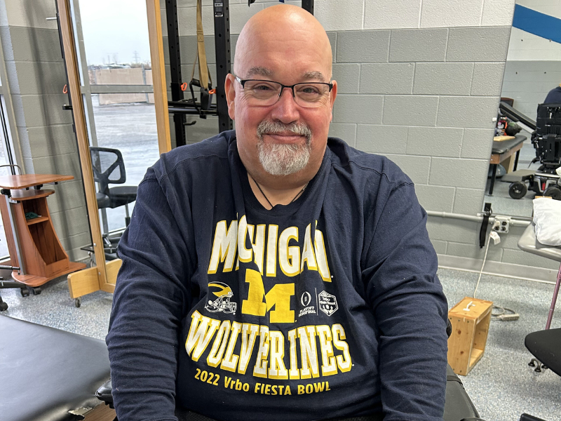 patient Mark sitting in his wheelchair at therapy