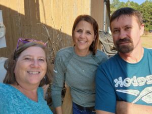 Patient Timmy pictured with two of his therapists.