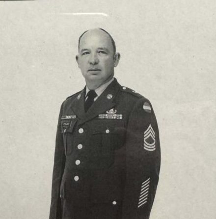 A young picture of our patient Leon in his military uniform. The image is black and white.