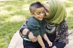 mother hugging her son